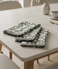 Load image into Gallery viewer, Floral-patterned napkins on a wooden surface